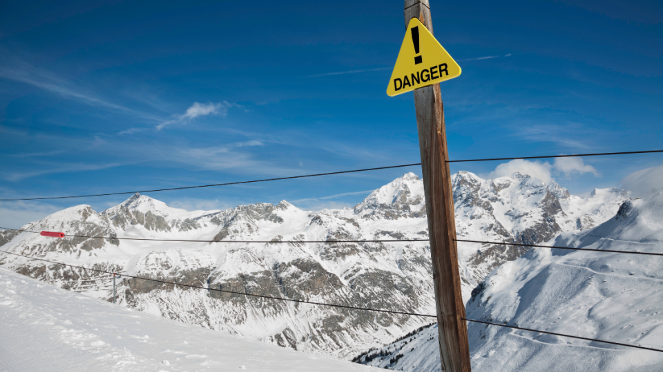 Off-piste skiing warning sign – check your winter sports cover before travelling