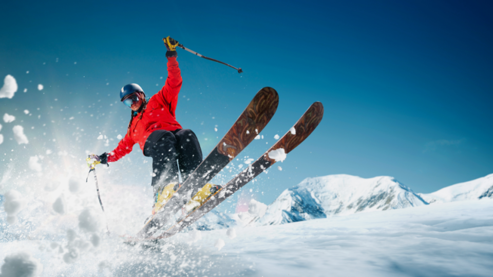 Winter Sports Travel Insurance – Skiers on mountain slope